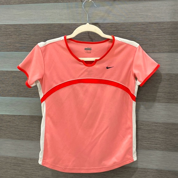 Nike sonic pink dry fit shirt. Worn once, perfect condition,small;can fit medium